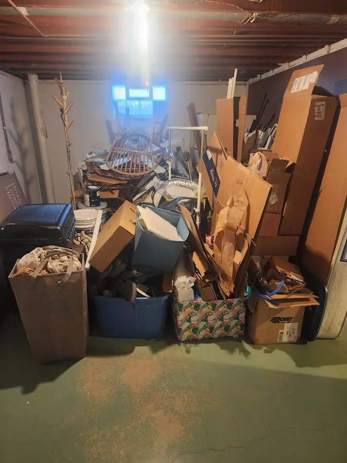 Roll-off dumpster container at job site for 15 Yard Dumpster Rental in Graham